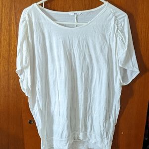 Uniqlo white top with batwing sleeves